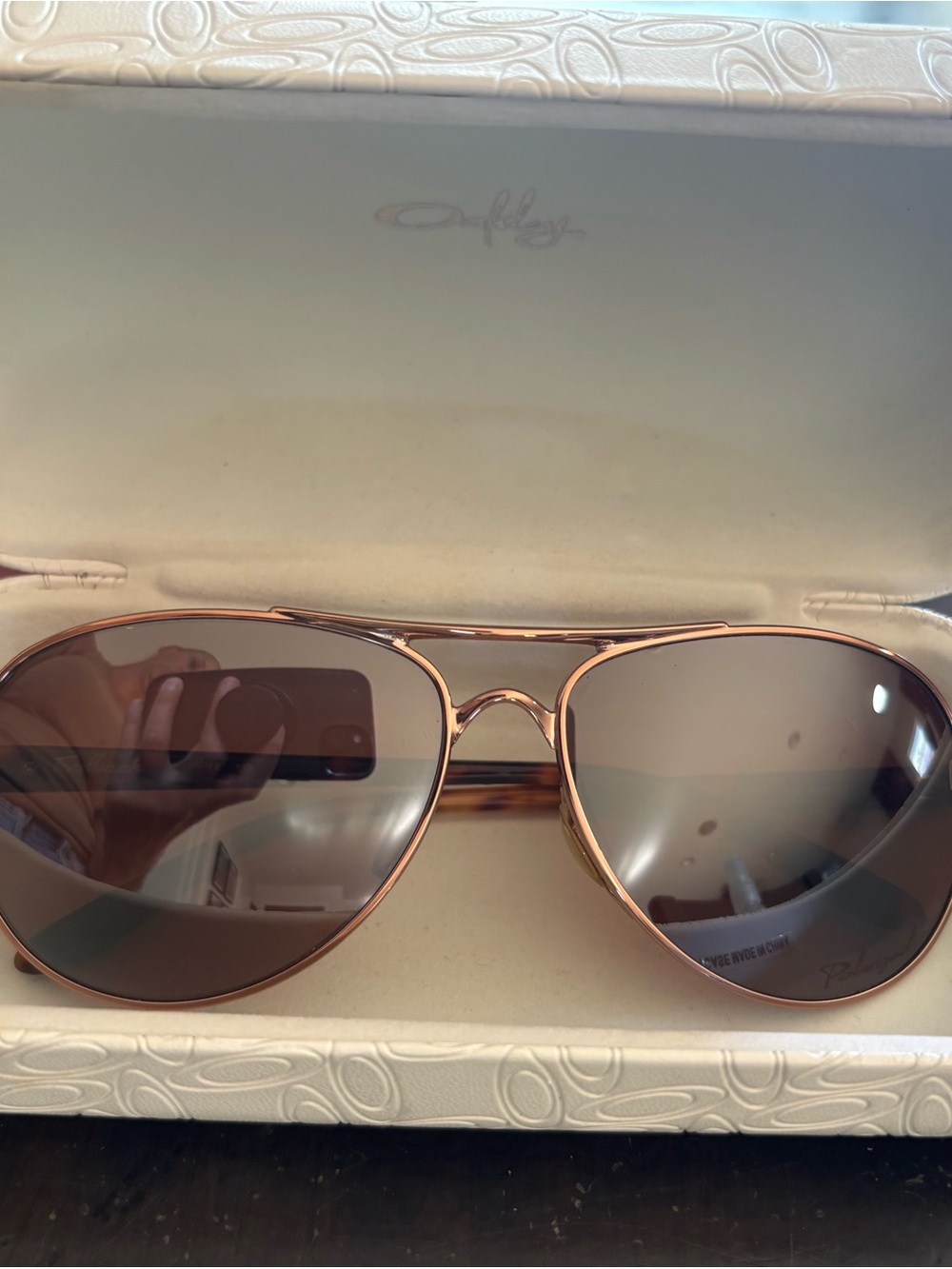 Oakley Rose Gold Aviator Sunglasses with Brown Lenses